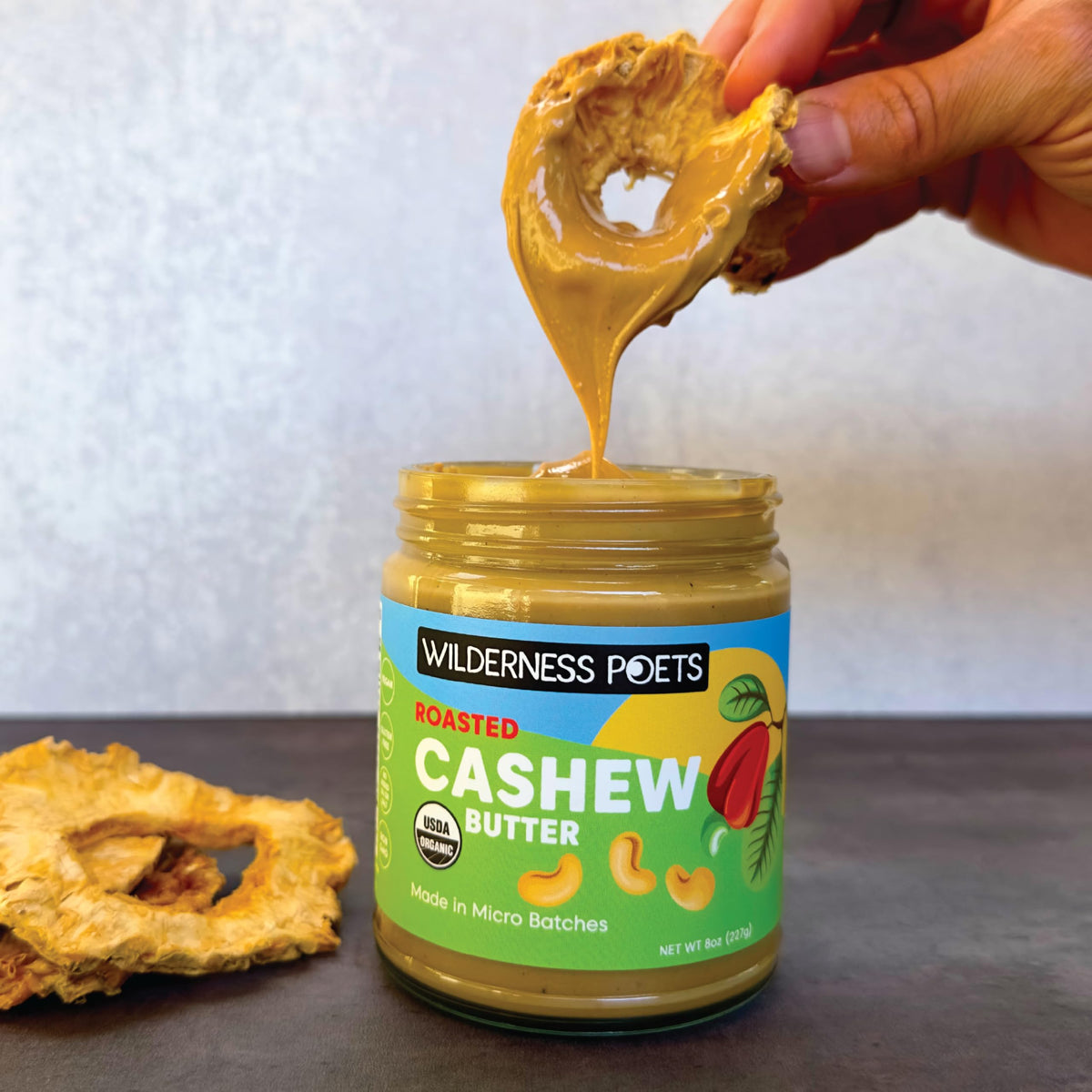 Wilderness Poets cashew butter jar side view in kitchen
