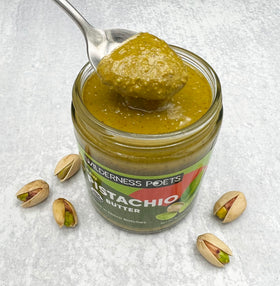 Wilderness Poets Organic Pistachio Butter closeup ingredients label, showcasing raw California pistachios.