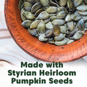 Scoop of Wilderness Poets pumpkin seed protein powder close-up for smooth texture