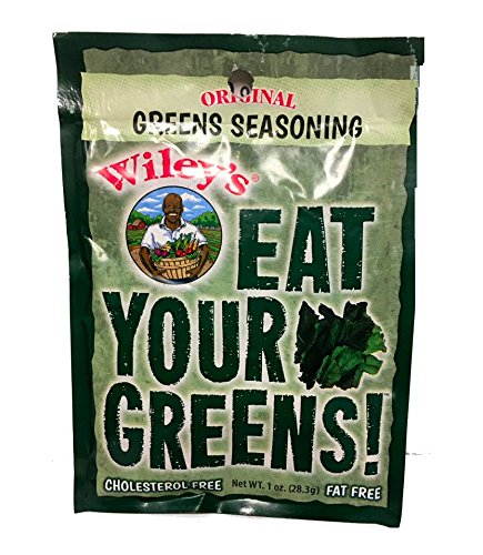 Wiley's Green Seasonings packet dispensing flavor on leafy greens.