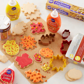 Wilton yellow icing creates a smooth finish on cookies and cakes.