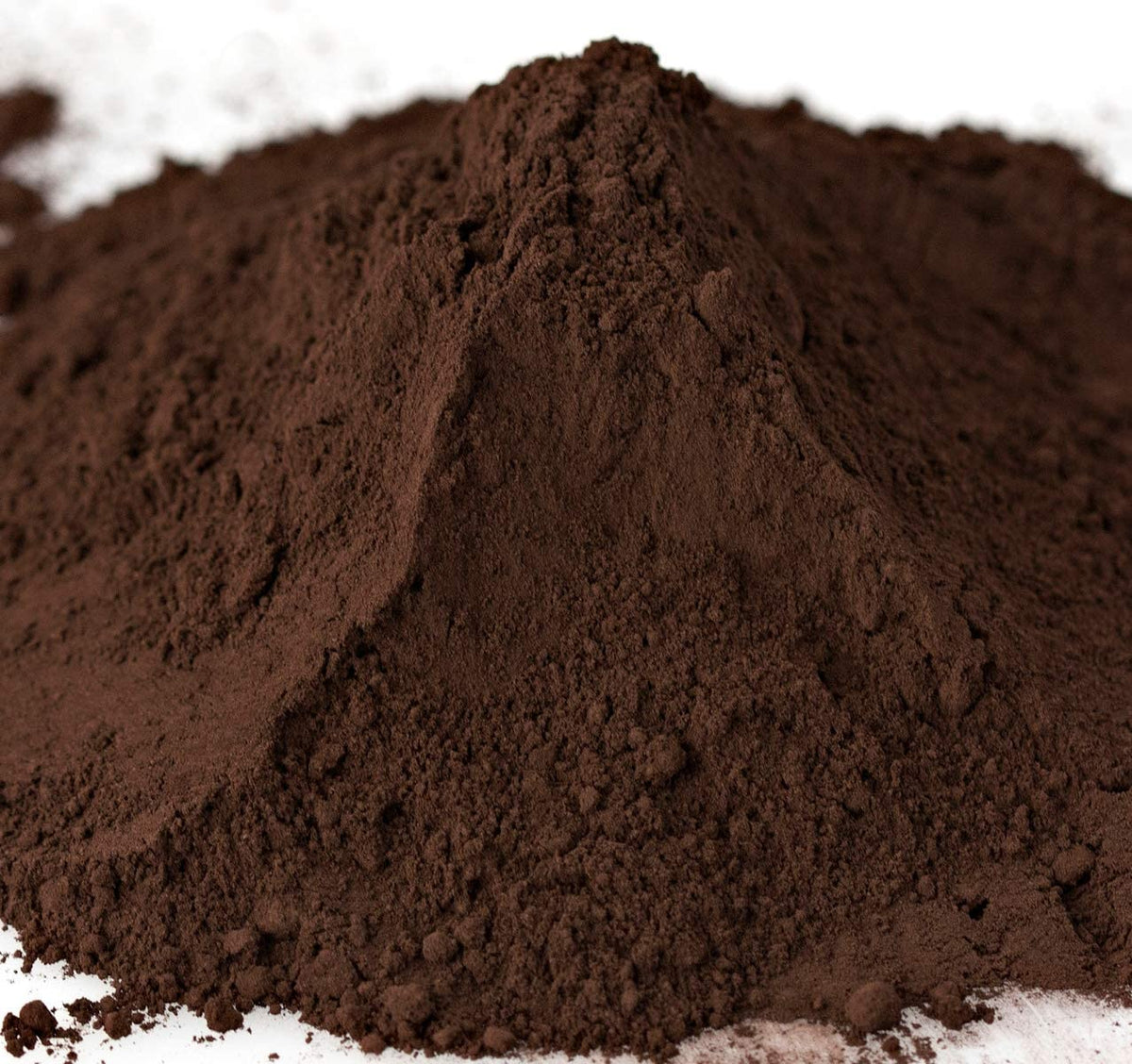 WinCrest Black Cocoa Powder bowl setup demonstrates rich chocolate flavor in baked goods.