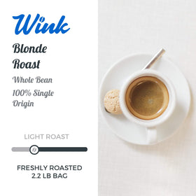 Wink Coffee Blonde Roast whole bean close-up, aroma ideal for a fragrant morning ritual.