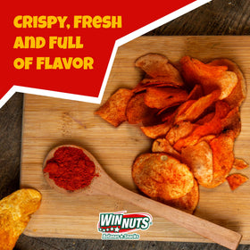 Lime wedge beside WINNUTS A la Diabla chips for bright balance.