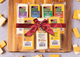 Wisconsin Cheese Company swiss block on a board, perfect for appetizers.