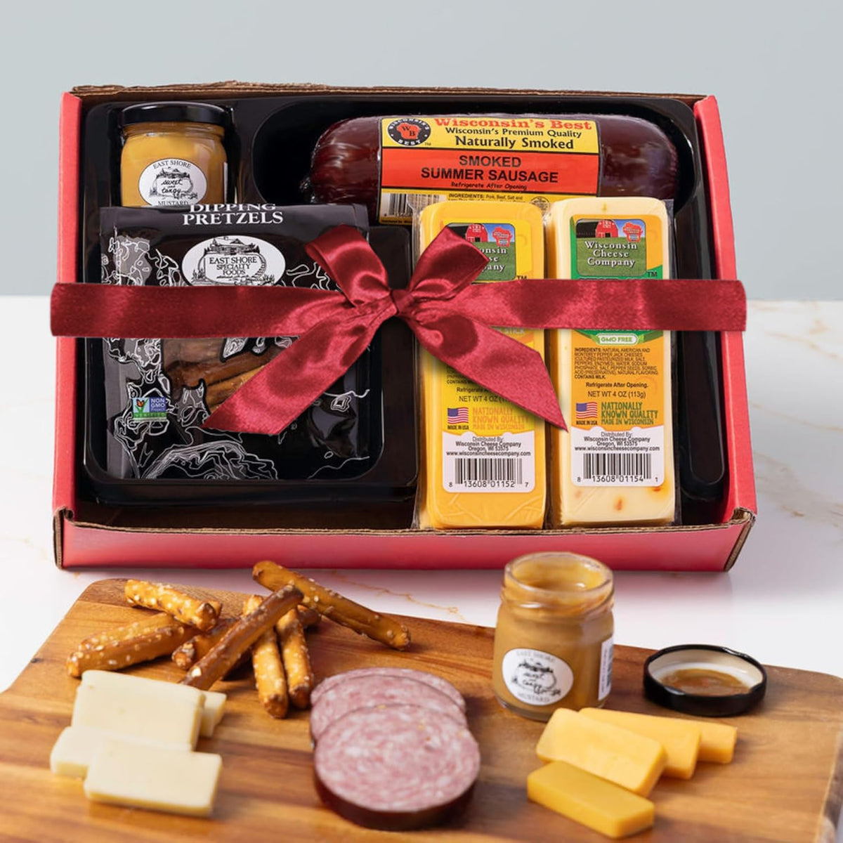 Wisconsin Cheese Company cheddar cheese block as a savory centerpiece.