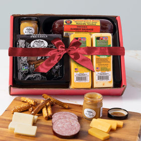 Wisconsin Cheese Company cheddar cheese block as a savory centerpiece.