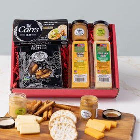 Wisconsin Cheese Company holiday gift box cover highlighting festive presentation for gifting.