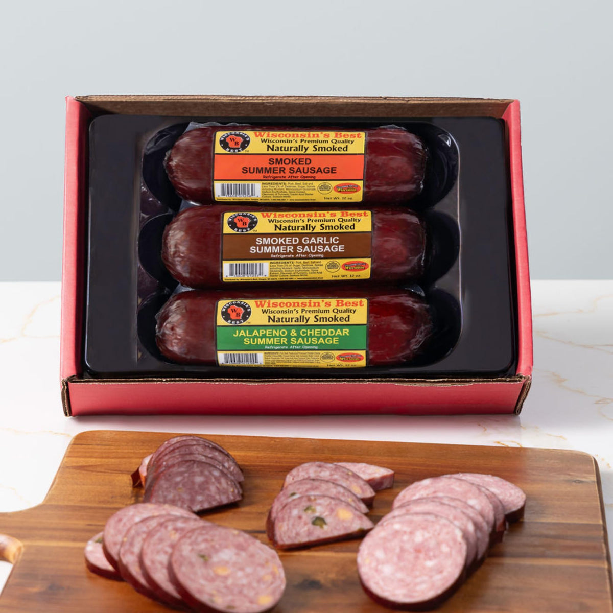 Wisconsin Cheese Company gift box front view, elegant packaging ready for gifting.