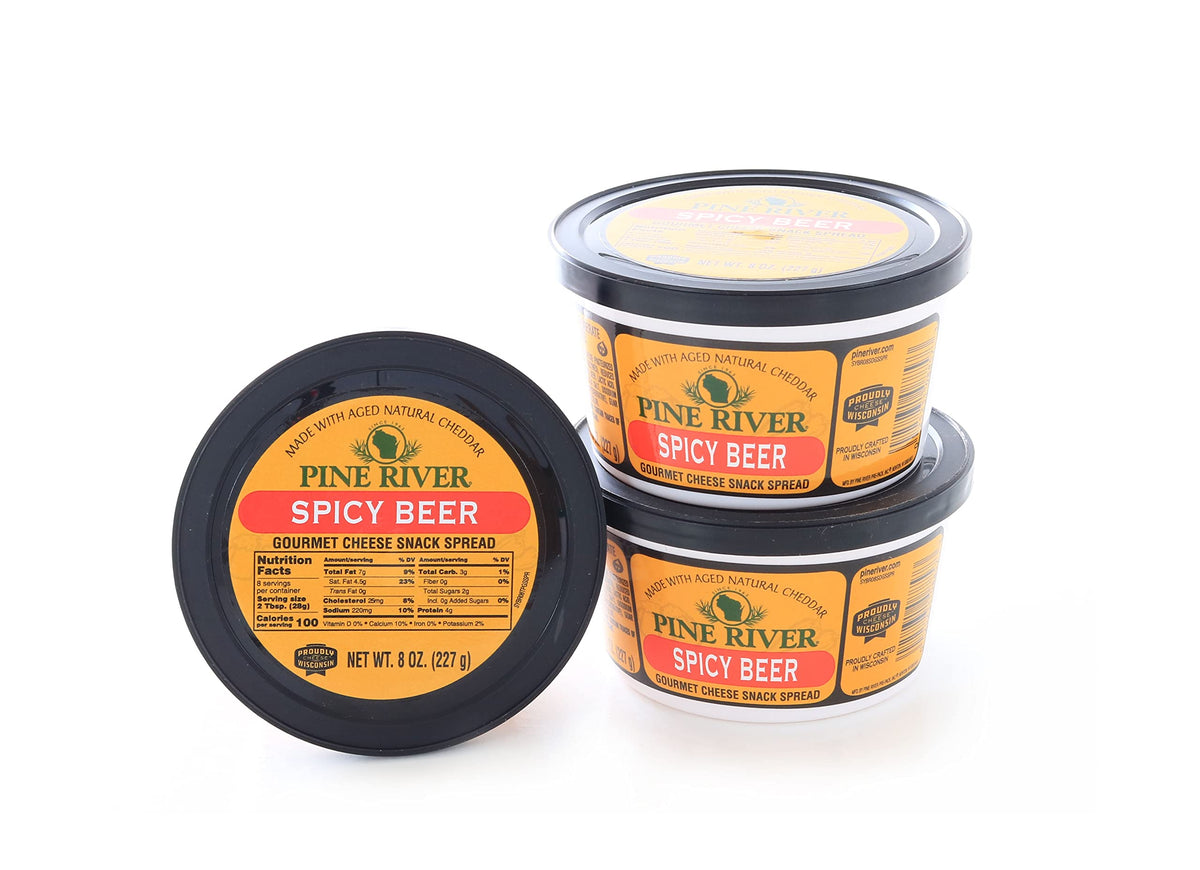Wisconsin Cheese Mart Pine River Spreads, spicy beer flavor beside pretzels.