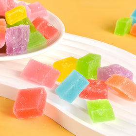 WJDDMGO Fruit-flavor gummies in assorted hues highlight bold strawberry, mango, lemon.
