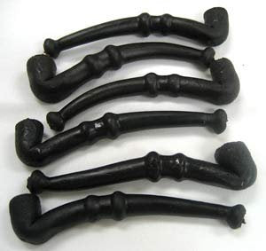 Wockenfuss Candies black licorice pipes on display, ideal for sharing at parties.