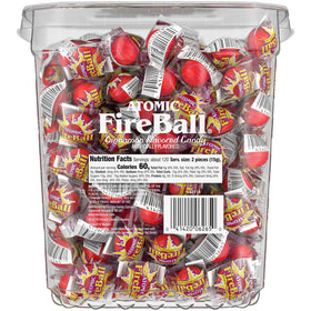 Bright red Wonka Atomic Fireball packaging visible on a store shelf