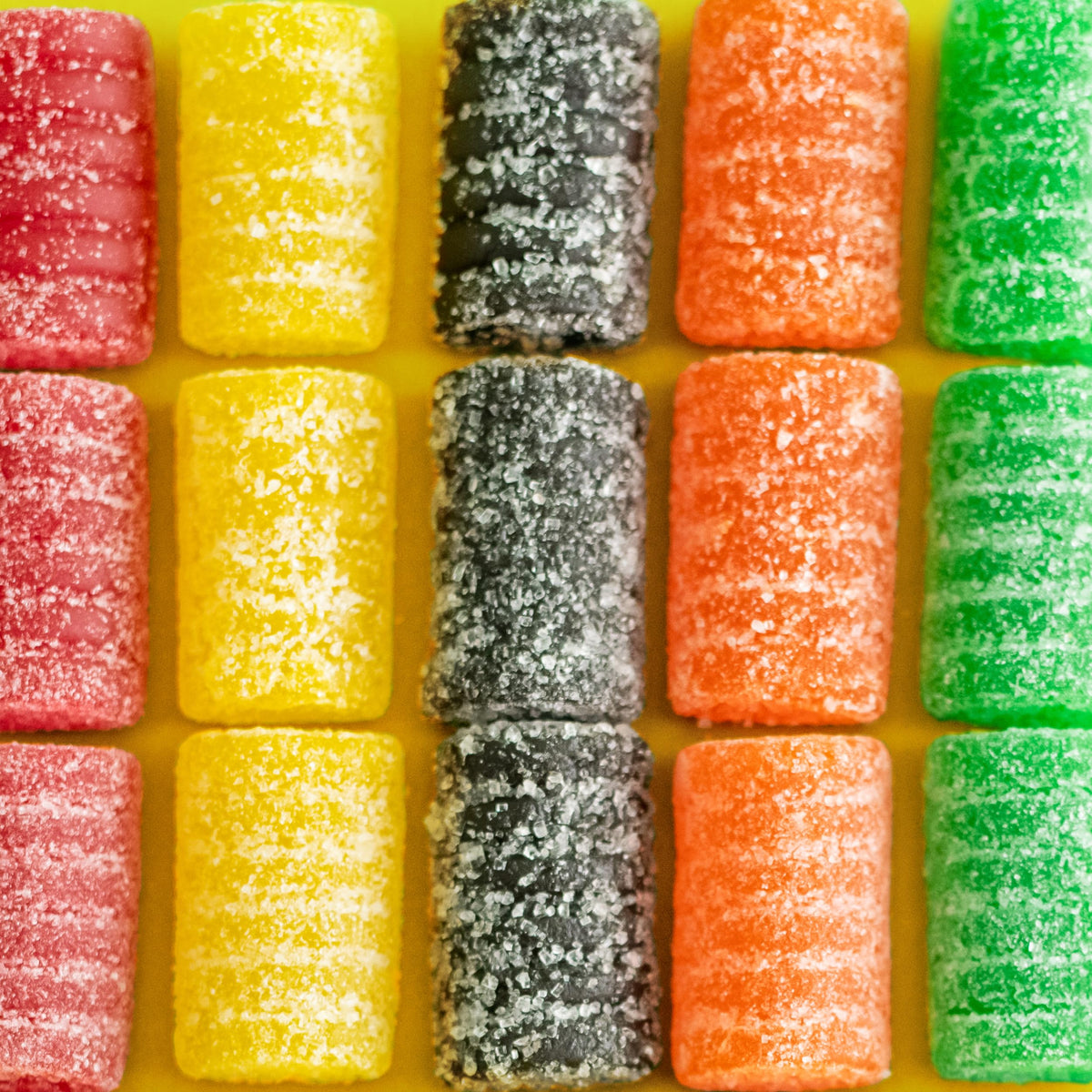 Close-up of colorful Chuckles showcases five fruit flavors for sharing and delight.