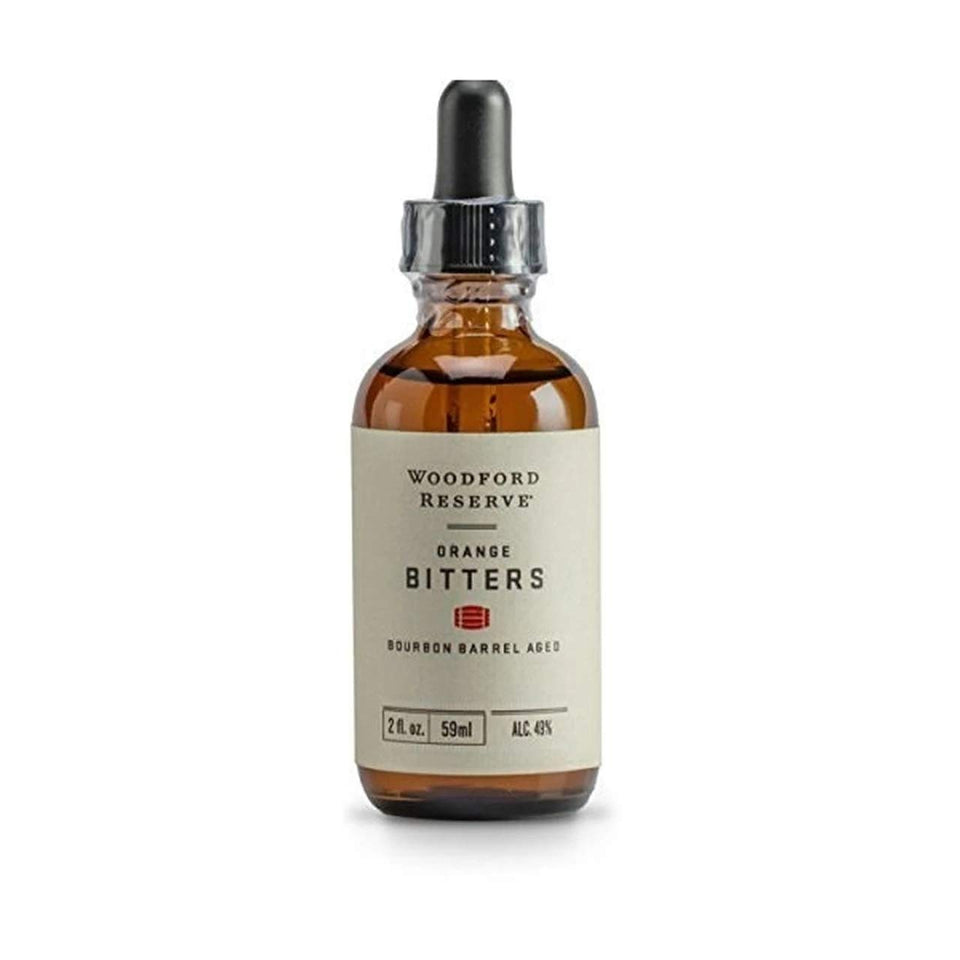 Woodford Reserve Orange Bitters bottle enhances citrus notes in cocktails.
