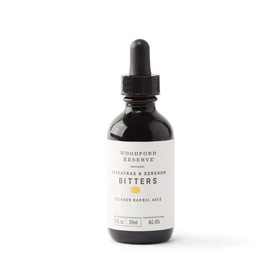 Woodford Reserve Sassafras and Sorghum Bitters bottle enhances Old Fashioned flavor with bourbon depth.