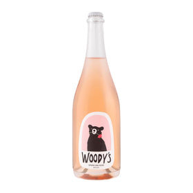 Woody's Sparkling Rosé bottle front view perfect for upscale celebrations, alcohol-free toasts.