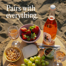 Woody's Sparkling Rosé packaging image demonstrates shelf-stable elegance.
