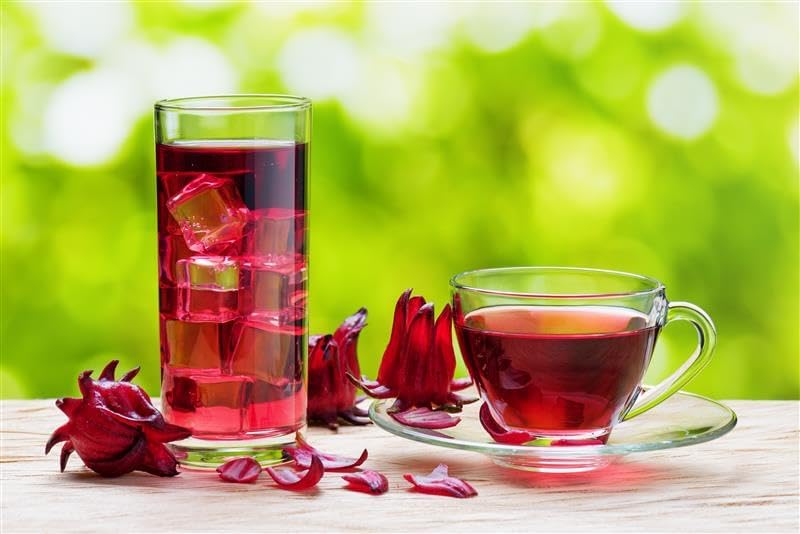 Worldwide Botanicals hibiscus tea loose leaf in bowl ready to steep.