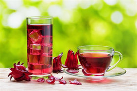 Worldwide Botanicals hibiscus tea loose leaf in bowl ready to steep.