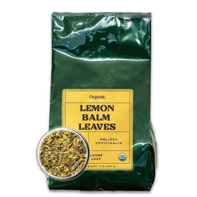 Worldwide Botanicals Lemon Balm Tea loose leaf close-up with pure leaves for relaxation.