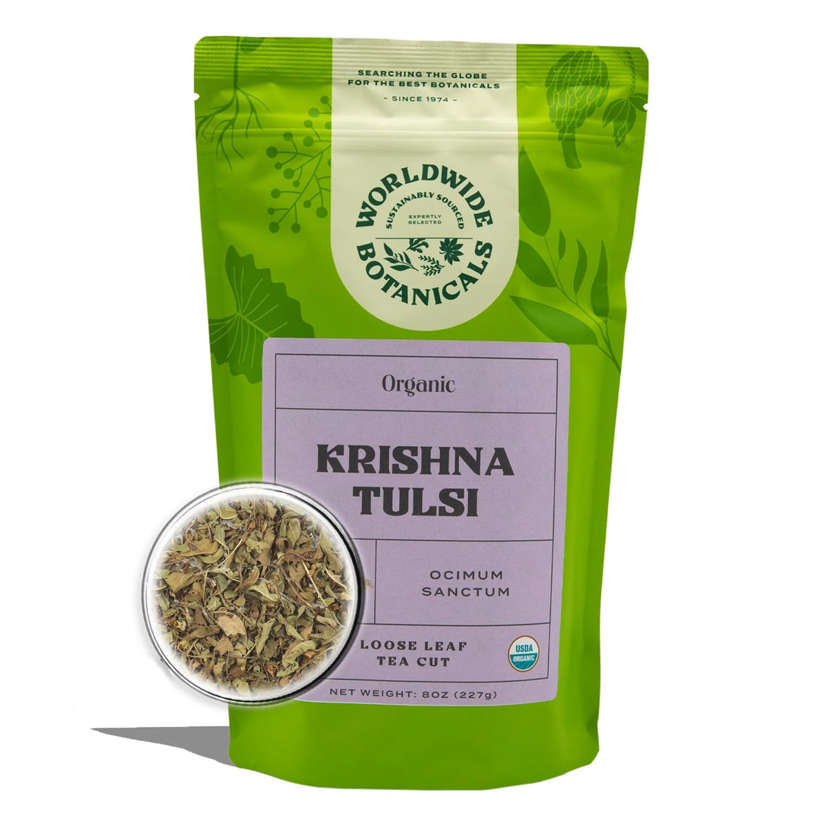 Worldwide Botanicals Krishna Tulsi loose leaf tea with purple tinged leaves and bright aroma.
