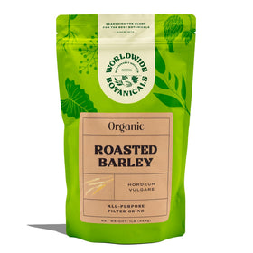 Worldwide Botanicals Orzo Barley Dark Roast cup with steam, caffeine-free alternative for daily ritual.