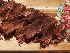 Wright's Liquid Smoke Mesquite bottle; robust smokiness for steak and burgers