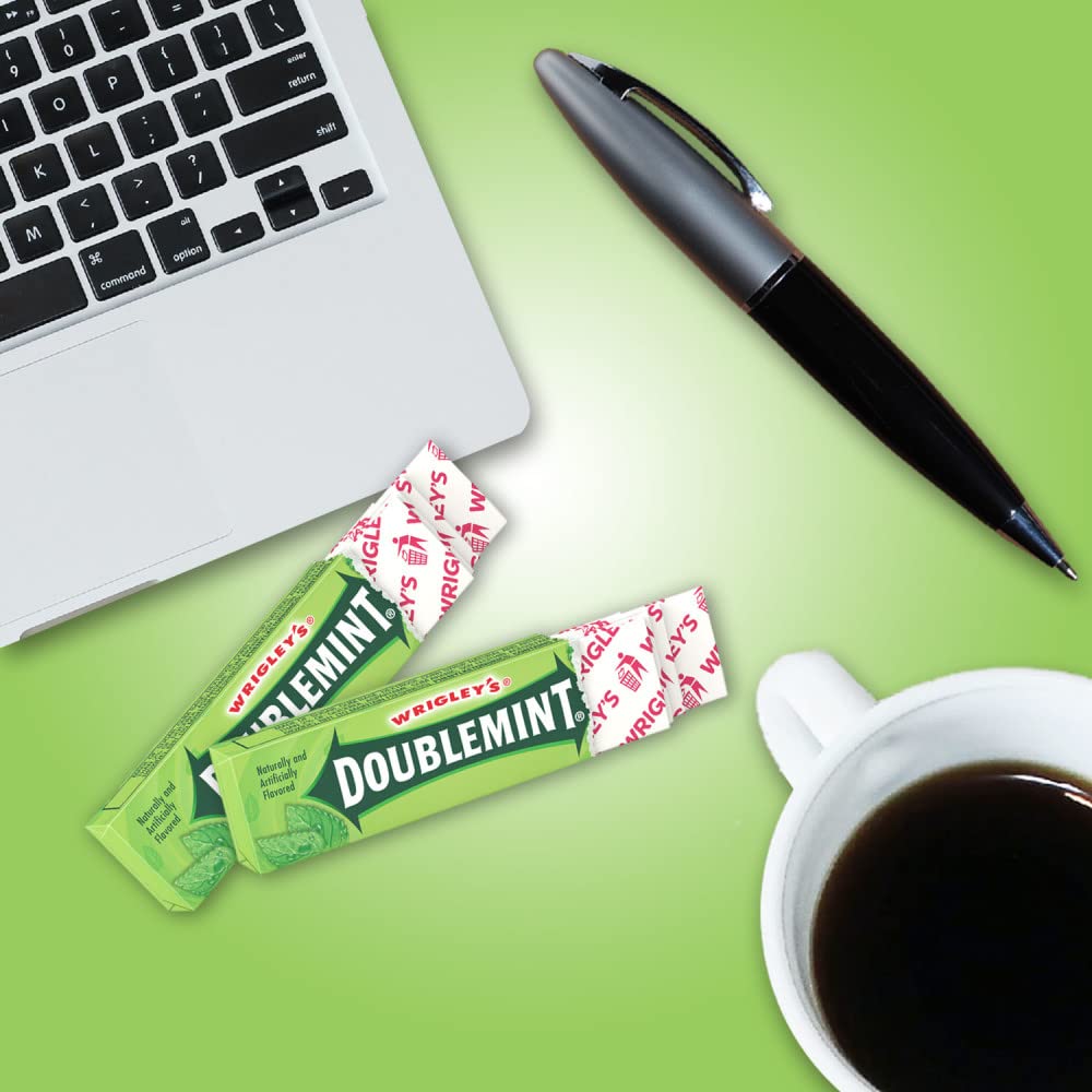 Two people sharing Doublemint gum during a break