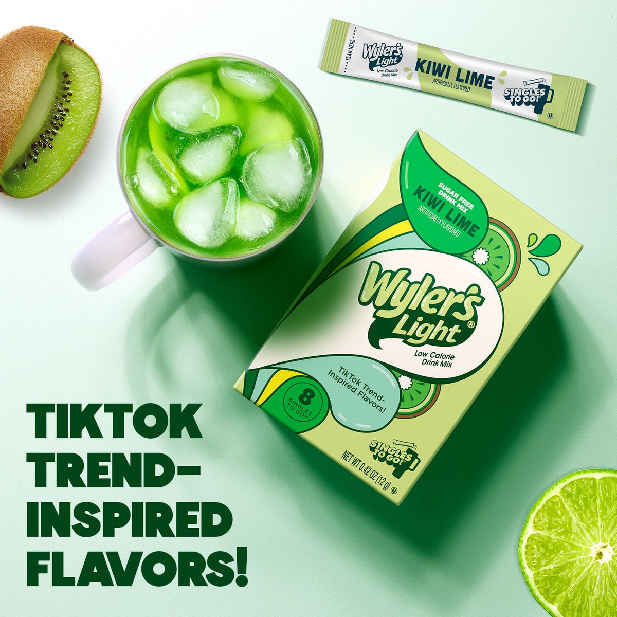 Wyler's Light kiwi lime packets dissolving in a glass for a bright drink.