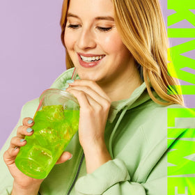 Prepared drink in a glass reveals bright kiwi lime flavor.