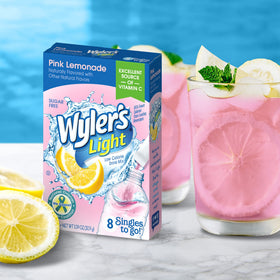 Wyler's Light Pink Lemonade packet being poured into a water bottle.
