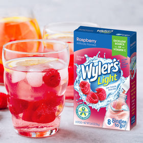 Wyler's Light Raspberry singles-to-go mix being poured for a refreshing sip.