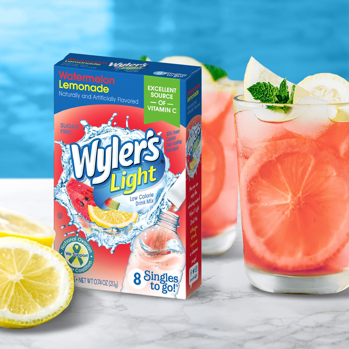 Wyler's Light Watermelon Lemonade dissolving in a glass with color blooming.