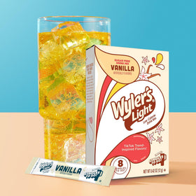 Wyler's Light Vanilla prepared drink in a glass showing creamy vanilla taste.