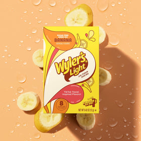 Wyler's Light Watertok Banana powder dissolving in water for quick flavor.