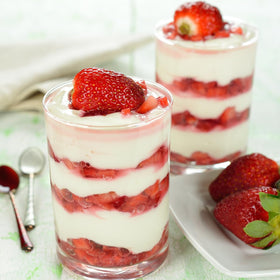 XBTEBBWL strawberry slices stirred into yogurt for easy flavor enhancement