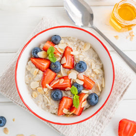 XBTEBBWL slices on cereal, adding berry flavor to a morning bowl