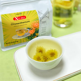 XIEJINJI Chrysanthemum Tea relaxation scene suggests a calm moment.