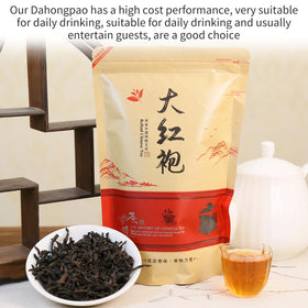 XIXICHA Da Hong Pao brewed tea in glass cup highlights inviting color and aroma.