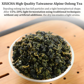 Brewing XIXICHA Dayuling Oolong Tea in a cup reveals floral aroma.