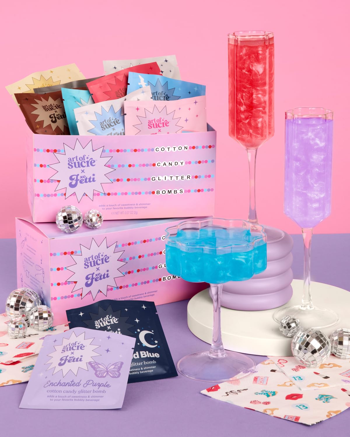 xo Fetti Art of Sucre Eras cocktail glitter dissolves in clear drinks.