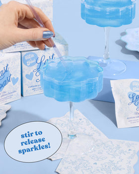xo Fetti dissolving cotton candy glitter bombs creating a shimmering drink moment