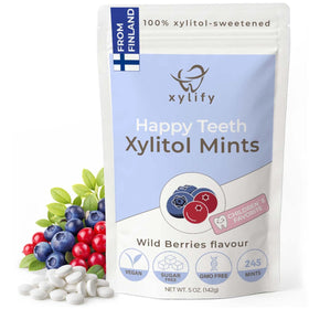 Xylify Happy Teeth Wild Berries mints bag front for daily sugar-free oral care.