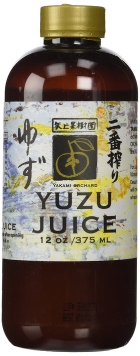 Yakami Orchard Yuzu Juice bottle pour highlights bright citrus aroma, perfect for cocktails.