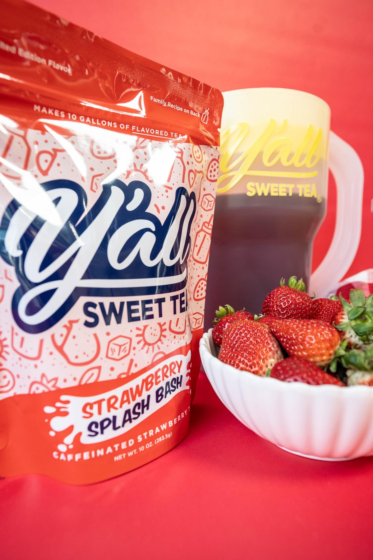 Y’all Sweet Tea Strawberry Splash Bash served over ice for outdoor parties.