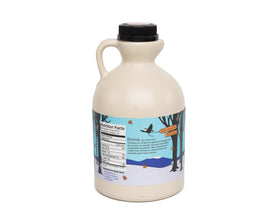 Barred Woods Maple Syrup being poured, showcasing strong flavor for glazes and desserts.