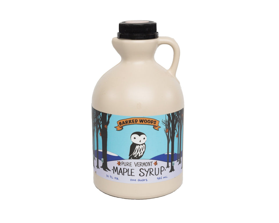 Yalu&Freedom Barred Woods Maple Syrup bottle with very dark pour, ideal for pancakes.