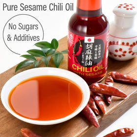 Close-up of sesame seeds in YAMASAN KYOTO UJI chili oil emphasizing depth