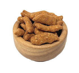 Close-up of YANKEETRADERS hot-spicy sesame sticks shown with texture.